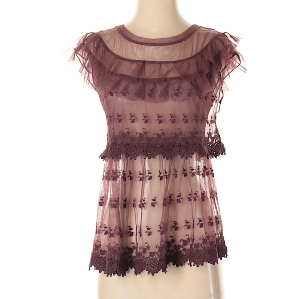 Free people see through blouse.